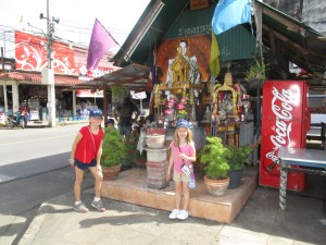 Spirit Houses with offerings in Chumphon
