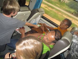 Our big friends on the train ride to Bangkok including a buddhist monk that made us beautiful origami birds with bills