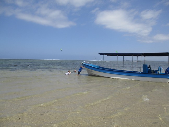 Low tide in Sanur beach makes for great games with the boats stuck on the sand
