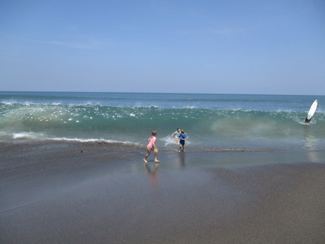 Playing with the waves in Echo beach