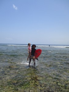 And when I am pooped after my lesson, my nice surfer-instructor picks me up to bring me back to shore... After all I am only 5 :-)