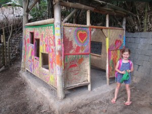 Clara's class is working on painting their playground play house