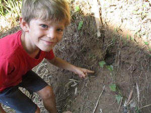 Marcus introducing us to his friend the toad who lives next to his classroom.